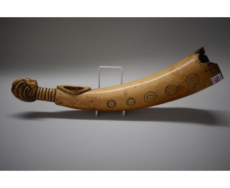 Ethnographica: a Mende tribe, Sierra Leone carved ivory oilphant or horn, with figural end, 45cm long, (chipped).&nbsp; 