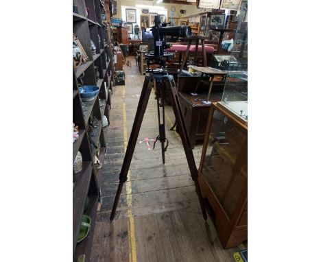 An HB 'Director No 12 Mk1' sight, No.306, with broad arrow stamp, on folding tripod. 