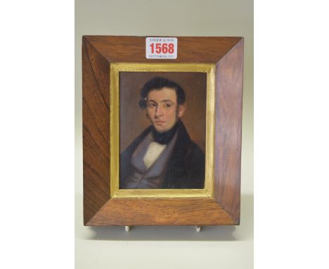 English School, early 19th century, a bust length miniature portrait of a gentleman, oil on oak panel, 13 x 10cm. 