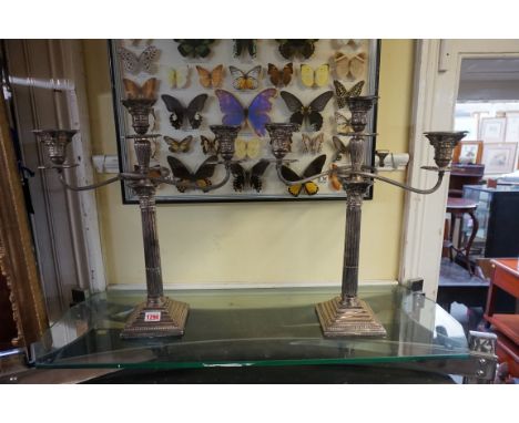 A pair of EPNS twin branch Corinthian column candelabra, 47cm high.&nbsp; 
