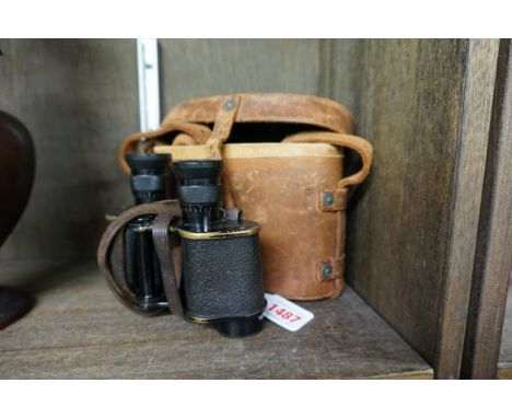 A pair of World War I period Kershaw &amp; Son Ltd binoculars,&nbsp;with broad arrow stamp, in tan leather case. 