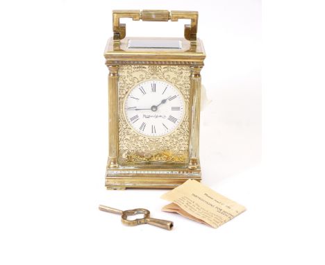 MAPPIN &amp; WEBB CARRIAGE CLOCK, Roman numerals on an enamel dial and fretwork ground of leafy scrolls, marked 'D2163' on ba