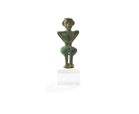  LURISTAN BRONZE FIGURE NEAR EAST, C. 1000 - 800 B.C. cast bronze, the stylised figure with janus head, perforated through th