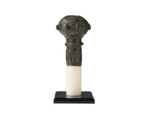  LURISTAN BRONZE MACEHEAD WESTERN ASIA, C. 1000 – 800 B.C. cast bronze, the cylindrical shaft with triangular engraving, lead