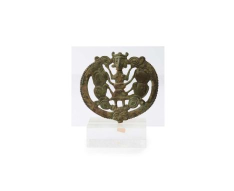 LURISTAN MASTER OF BEASTS STAFF FINIAL WESTERN ASIA, C. 1000 – 800 B.C. cast bronze, contained within a circular border, the
