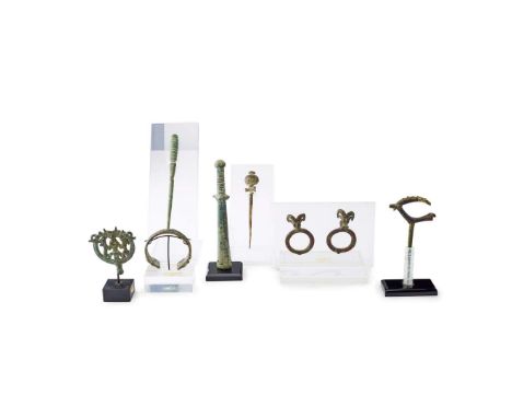  COLLECTION OF ANCIENT LURISTAN BRONZE ARTEFACTS WESTERN ASIA, EARLY FIRST MILLENNIUM B.C. cast bronze, consisting of; three 
