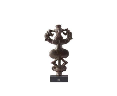  LURISTAN BRONZE “MASTER OF ANIMALS” FIGURE WESTERN ASIA, 800 – 600 B.C. bronze, the Janus figure wearing a rounded cap, with