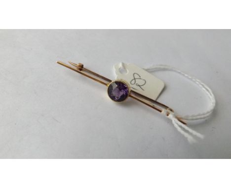 15ct gold bar brooch set with a single large circular amethyst 3.6g inc       