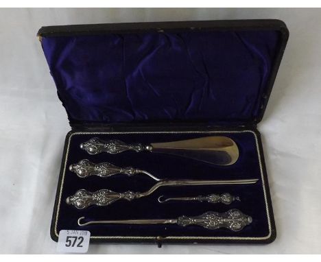 A boxed shoe lift &amp; button hook set with embossed handles B'ham 1908 by WBS       