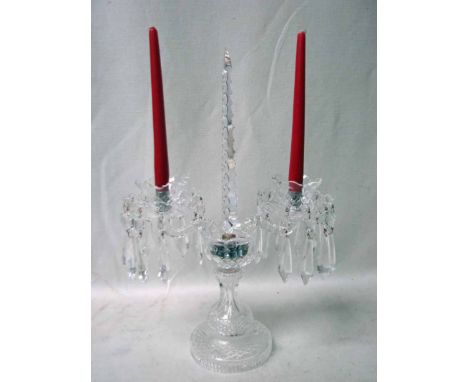 A Waterford Crystal glass two-branch Candelabra with three-sided facetted central tapering needle flanked by a pair of sconce