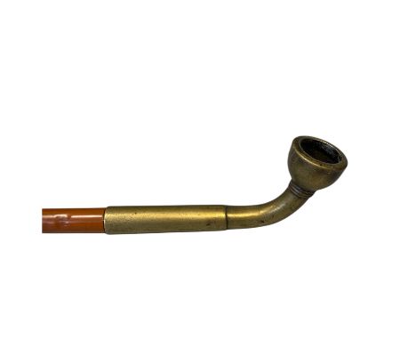 A bamboo and brass Opium pipe Approximately 103cm long&nbsp;Good condition
