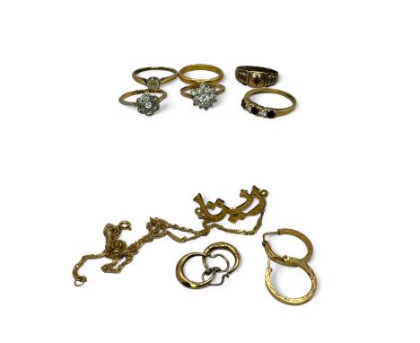 A collection of gold jewellery. Comprising a 22ct gold band ring, size M;&nbsp; a diamond daisy ring, testing as 18k gold, si