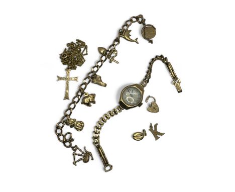 A 9ct gold charm bracelet with seven charms attached and a detached heart padlock and two further charms, a 9ct gold cased Ar
