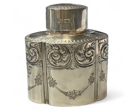 An Edward VII embossed sterling silver tea caddy, marked for the Atkin Brothers, Sheffield 1908. Measuring approximately  8cm