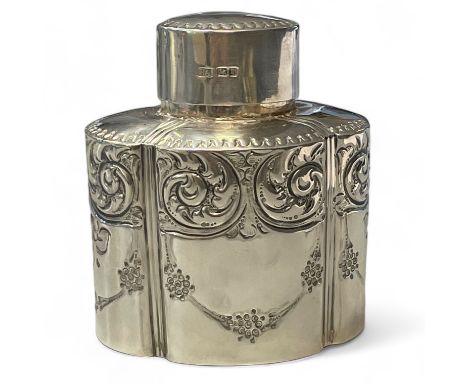 An Edward VII embossed sterling silver tea caddy, marked for the Atkin Brothers, Sheffield 1908. Measuring approximately  8cm