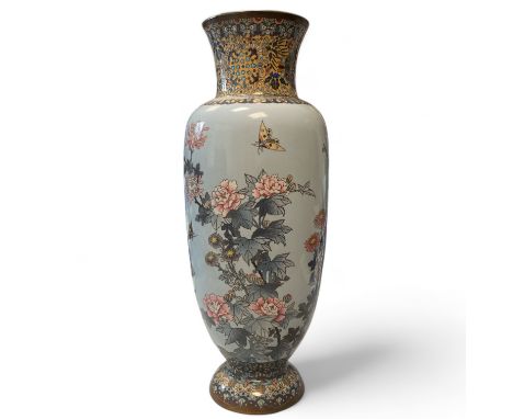 A good cloisonn&eacute; enamel vase decorated with flowering prunus and insects. 13cm diameter x 40cm tall in good condition.
