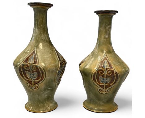 A pair of Royal Doulton art Nouveau Vases, Number 2464,9cm x 9cm x 20cm tall. Both in good condition.&nbsp;