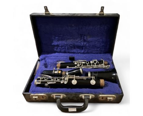***AWAY***
An English clarinet, no 429376 with hard case.