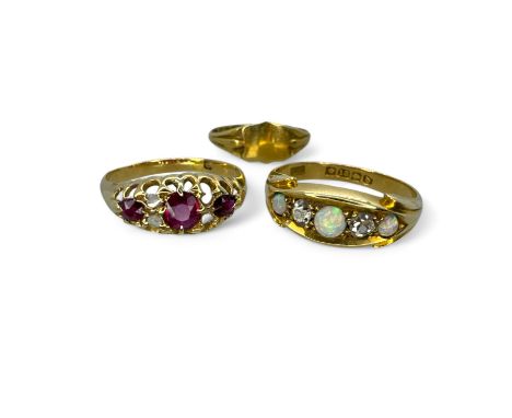 An 18ct gold opal and diamond Edwardian panel ring (Birmingham 1901), size L; along with a similar ruby and diamond dress rin