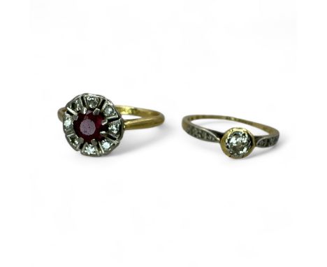 Two early 20th century diamond set rings, both marked as "18ct + Plat" and testing as gold. One a solitaire, a 3.4mm old mine