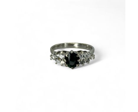 An 18ct white gold diamond &amp; sapphire dress ring. Size M1/2. Gross weight approximately 2.86 grams.&nbsp;