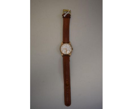A vintage Cyma 9ct gold manual wristwatch, on leather strap. 