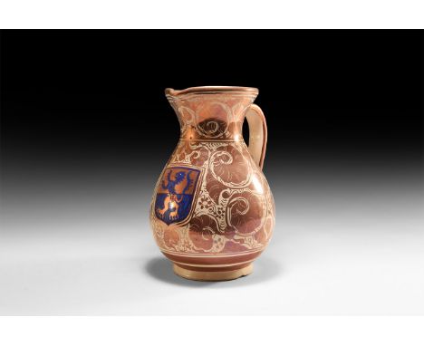 19th-20th century AD. A white-glazed ceramic jug with bulbous body, funicular mouth with pouring lip, basal ring, strap handl