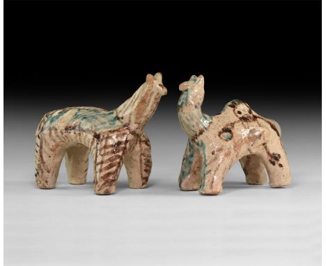 An undated archaistic group of glazed ceramic animals with brown and green texture detailing.  785 grams total, 13-15cm (5-6"