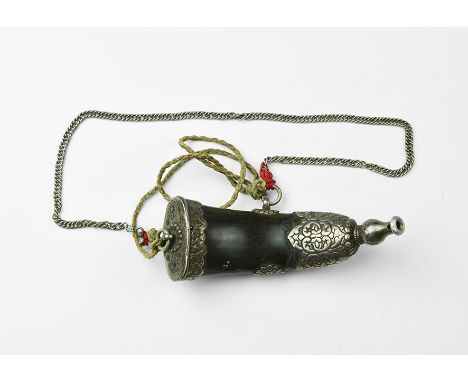 20th century AD. A powder flask composed of a flattened horn with applied metal ornamentation; metal collar and cap with susp