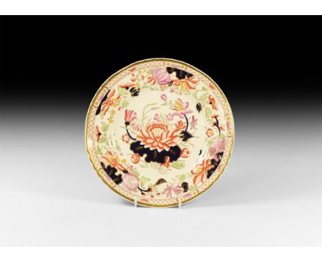 20th century AD. A glazed ceramic plate with oriental floral imagery, marked to the reverse 'Mason's Ironstone', 'Oriental Wa