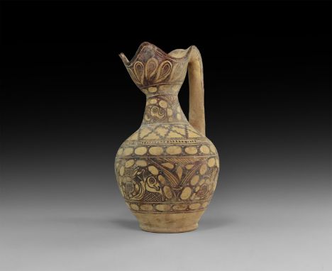 An undated archaistic unglazed ceramic jug with bulbous body, tapering neck, broad bulbous mouth with scooped pouring lip and