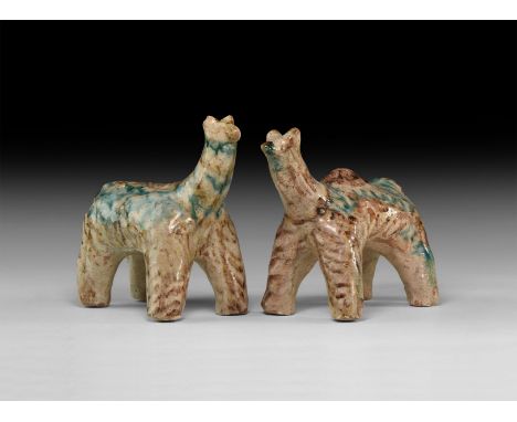 An undated archaistic group of glazed ceramic animals with brown and green texture detailing.  909 grams total, 14-15cm (5 1/
