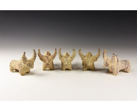 3rd millennium BC. A group of five ceramic zebu figures with painted linear detailing.  575 grams total, 89-93mm (3 1/2 - 3 3