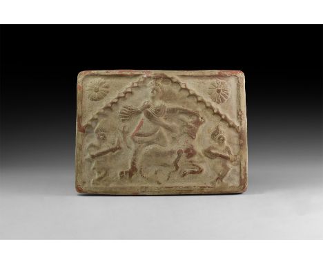 An undated archaistic ceramic plaque with high-relief scene of Mithras performing the tauroctony with flanking attendants and