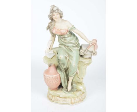 A Royal Dux figurine "Historia", late 19th / early 20th CenturyThe scene of a lady seated holding a book and a quill, stamped