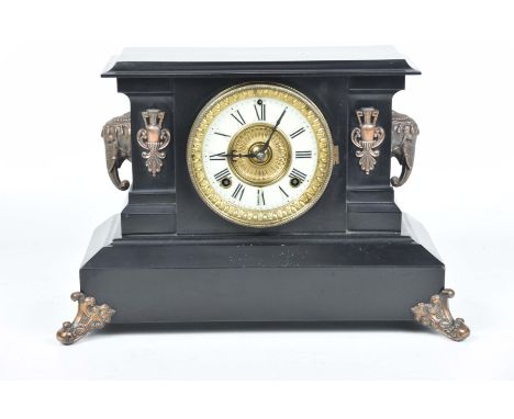 A slate mantel clock, late 19th early 20th Century12cm white enamel dial with Roman numerals, the works stamped Ansonia clock