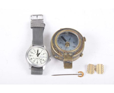 A Lorus wristwatchTogether with, a compass, horseshoe stick pin and a single cufflink (3)