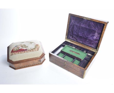 A Pollard oak and brass bound jewellery cabinet mid 19th CenturyLid opens to reveal numerous compartments with drawer below, 