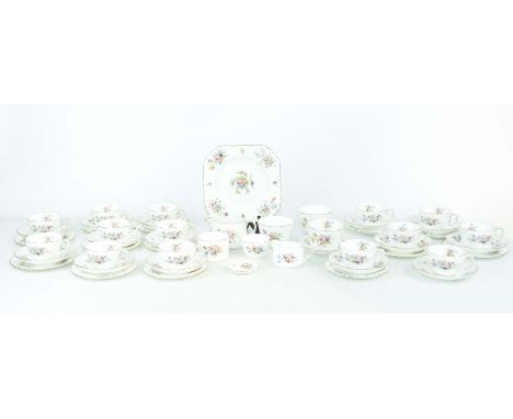 A Minton Marlow pattern tea serviceComprising six cups, six saucers, six tea plates, milk jug and two slop bowls, further Mar