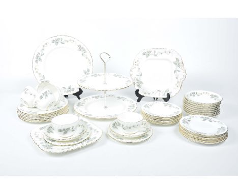 A Minton Greenwick tea service, forty piecesTo include a two tier cake stand, bread and butter plates, cups, saucers and side