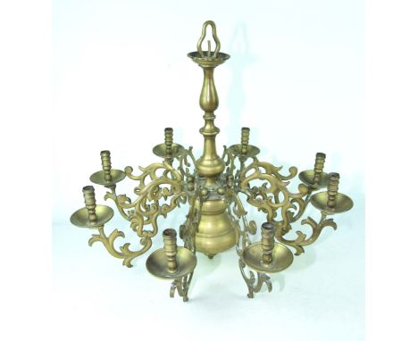 A substantial eight branch Dutch style ceiling light, 20th CenturyThe 62cm high light with individual candle holders with dri
