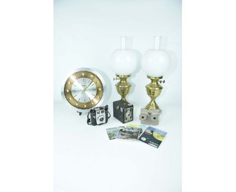 An Acctim metal wall clock, late 20th Century29cm dial, two brass oil lamps, Bilora box camera, Brownie Twin Twenty box camer