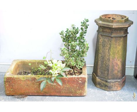 A Salt glazed feed trough and a stone chimney potThe trough of rectangular form, the chimney pot of tapering octagonal form, 