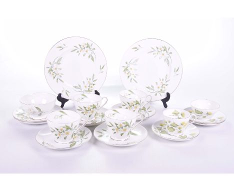 A Shelley Syringa pattern part tea serviceComprising four cups, four saucers, sugar bowl, side plates