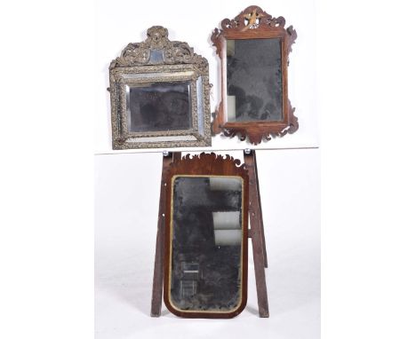A Brass mounted cushion shaped mirror in the 17th Century style, early to mid 20th Century The oblong mirror with decorative 