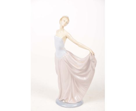 A Lladro figure of a young woman wearing an evening gownModel wearing a tiara with arms outstretched, 30cms high   CONDITION 