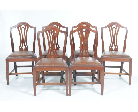 A set of six mahogany Chippendale style dining chairs, early 20th CenturyEach with an arched back and pierced splat above a l