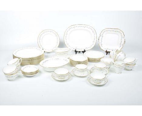 A Minton Champagne pattern dinner and tea serviceComprising eleven dinner plates, sauce boat and plate, eleven piece tea serv