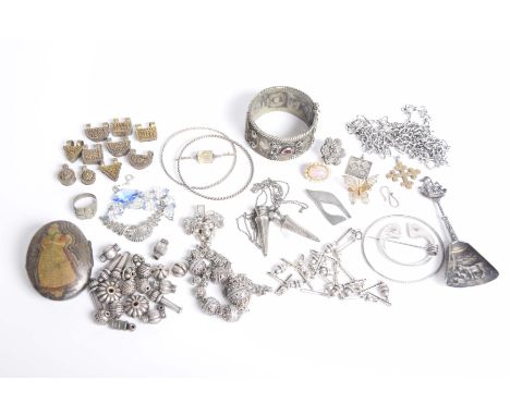 A collection of silver and white metal jewelleryTo include; a continental white metal bangle, chain and brooches (Qty)