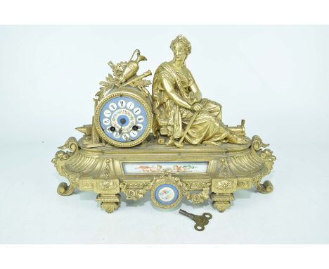 A Louis XVI style ormolu and porcelain mounted French mantel clock, mid 19th CenturyThe 8cm porcelain dial with flower decora